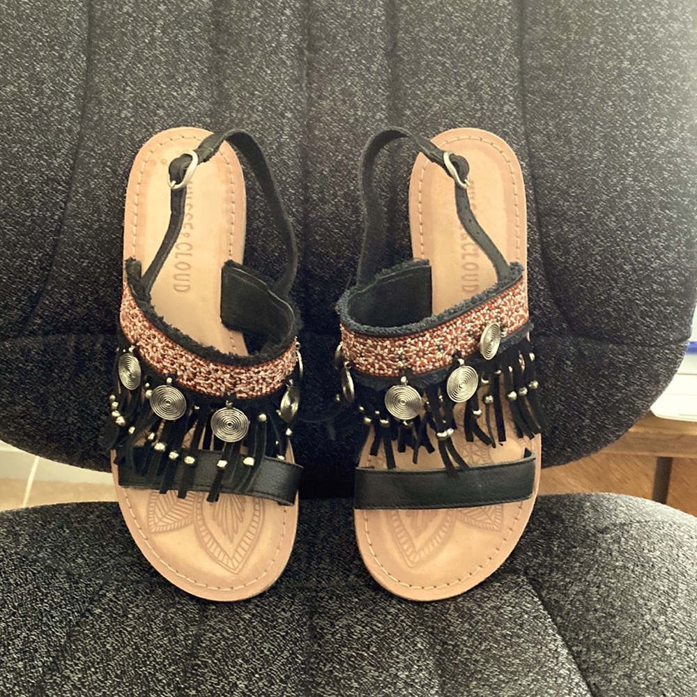 Women’s black and tan sandals with black fringe, mosaic pattern